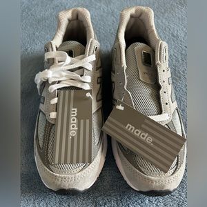 Brand new in box, never worn New Balance “Made” grey running/course shoes.